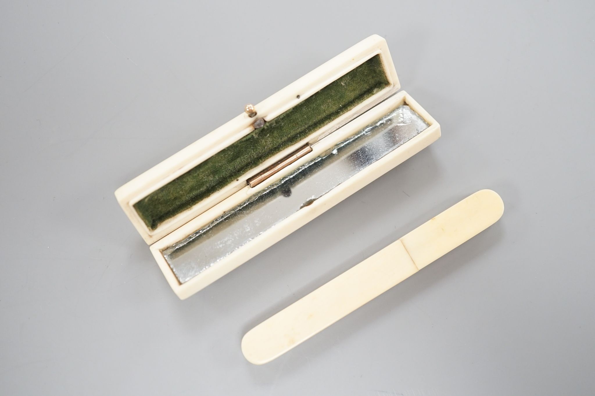 A yellow metal inset ivory tooth pick case and an Ivory needlecase 8cm
